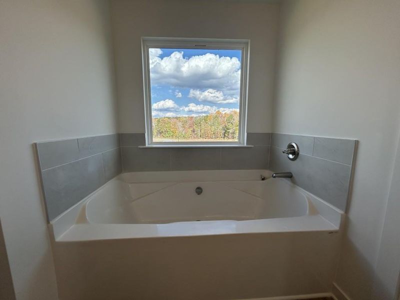 Furnished interior view inside a new home in Sutton's Landing, Statham (Image 9).