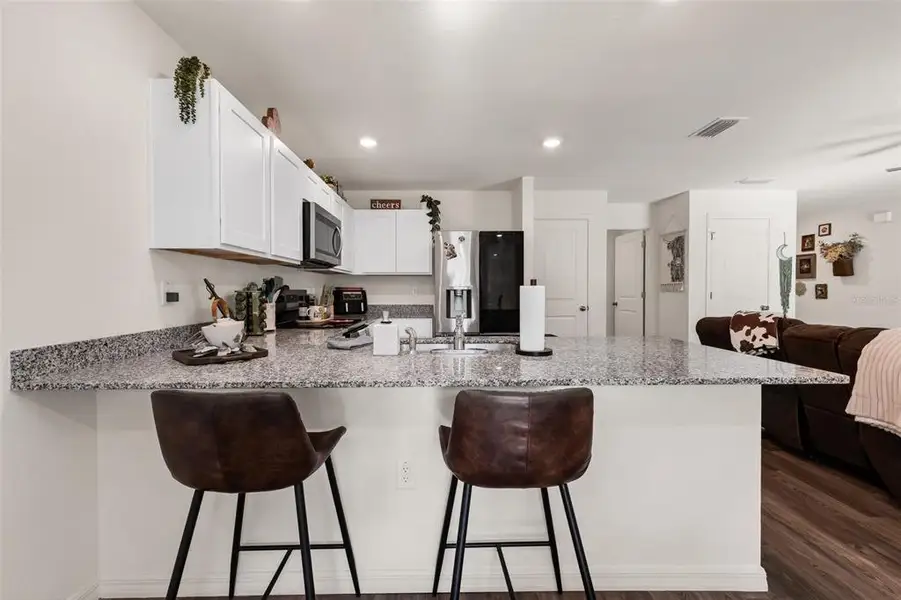 Furnished interior view inside a new home in , North Port (Image 11).