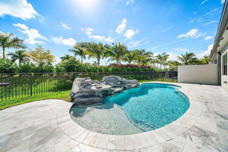 Exterior details and patio area of a home in Valencia Grand, Boynton Beach (Image 21). Exterior details and patio area of a home in Valencia Grand, Boynton Beach (Image 21).