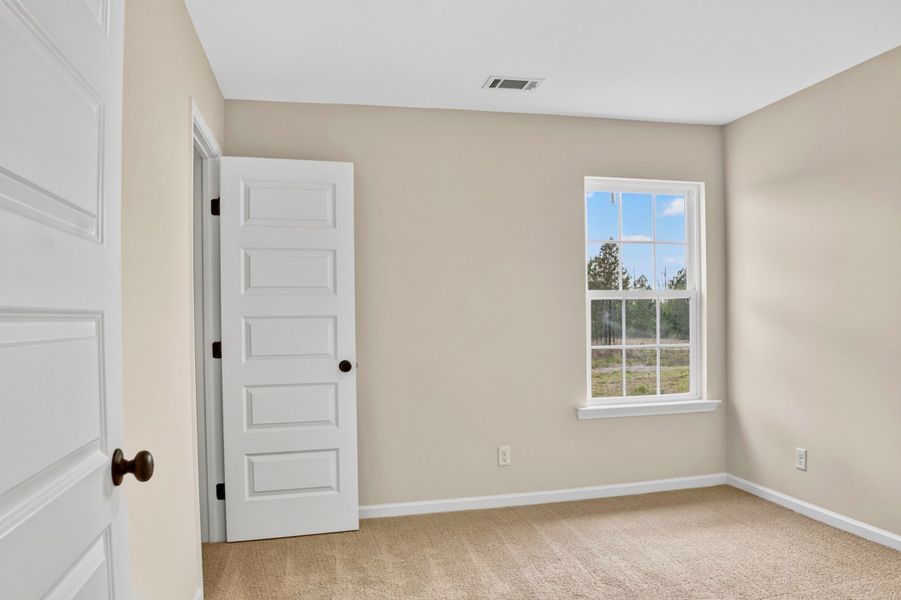 Representative unfurnished interior of a home built from the The Sunbury by RTS Homes in Doctor's Creek, Ludowici (Image 27).