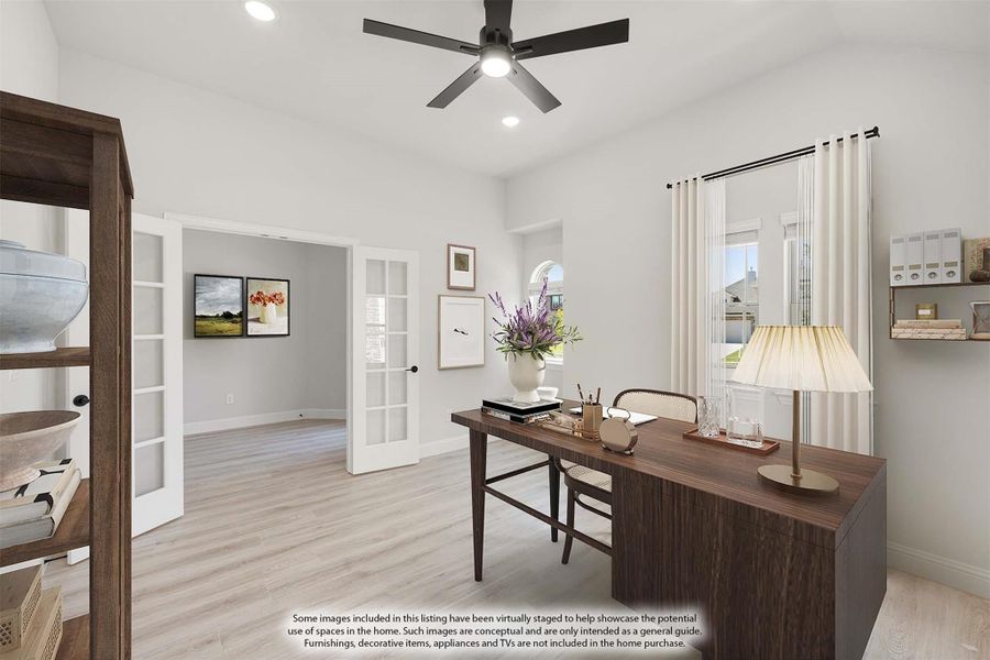 Home office with wood desk, ceiling fan, French doors, and light hardwood floors