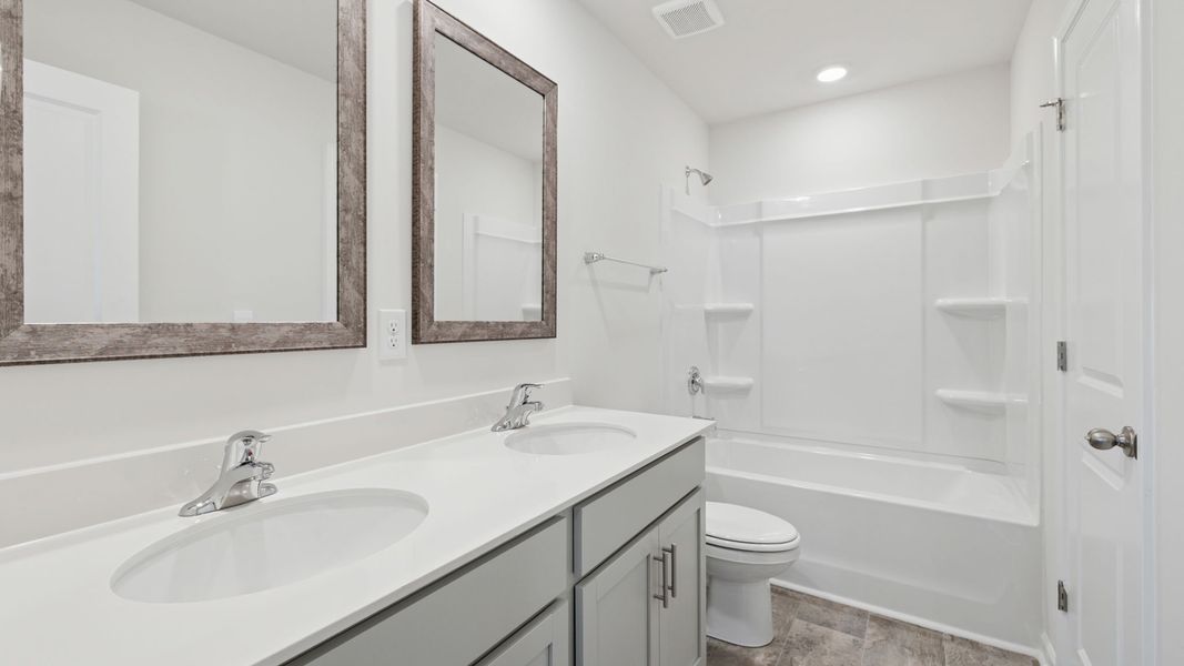 Furnished interior view inside a new home in Durbin Meadows Traditions, Fountain Inn (Image 8).