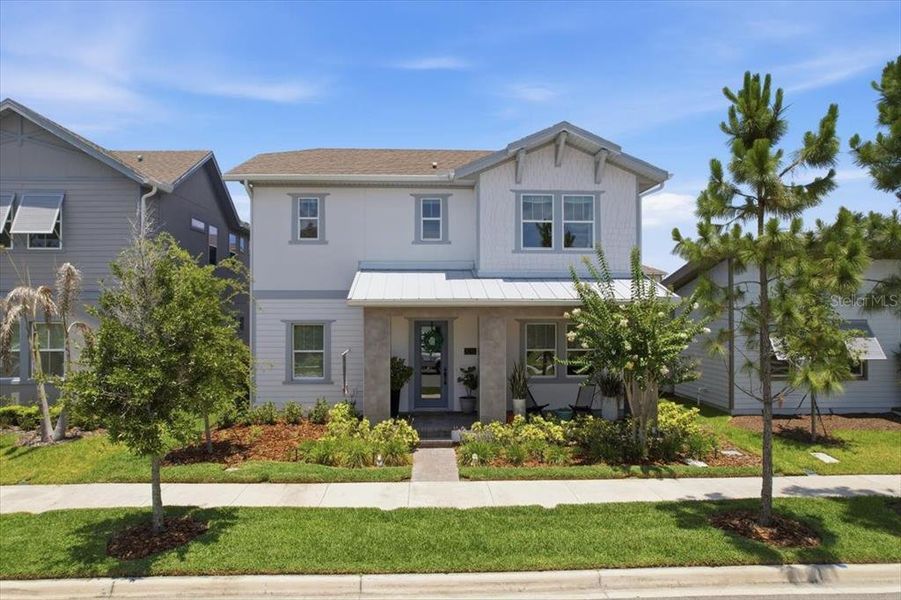 Front exterior of a new home in , Orlando, FL, highlighting curb appeal (Image 2). Front exterior of a new home in , Orlando, FL, highlighting curb appeal (Image 2).