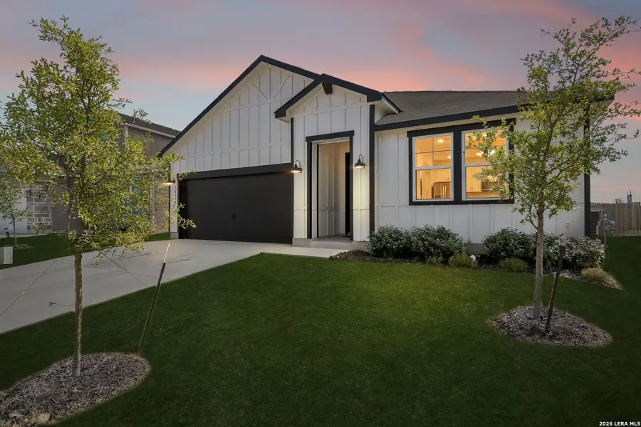 Front exterior of a new home in Hickory Ridge, Elmendorf, TX, highlighting curb appeal (Image 21).