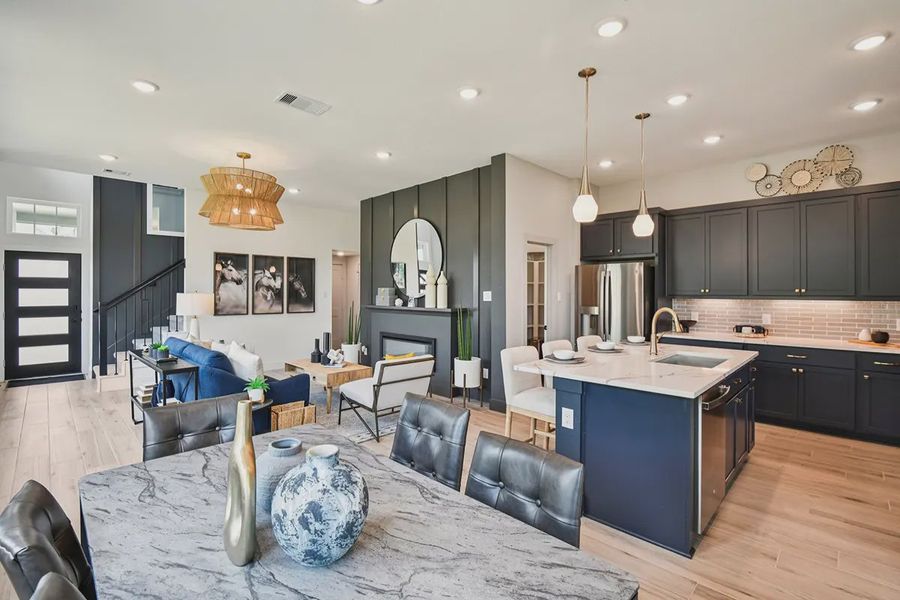 Furnished interior view inside a new home in Meridiana Chateau, Manvel (Image 26).