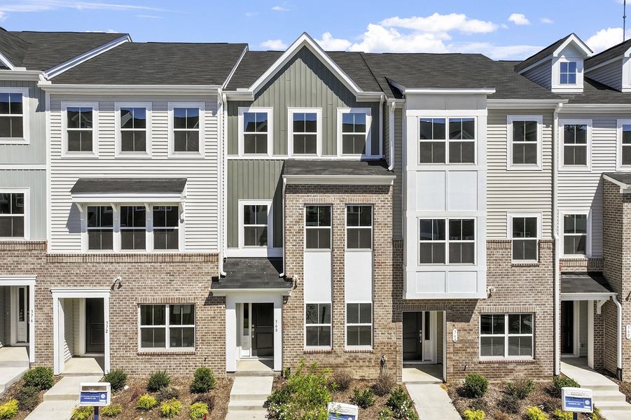 Front exterior of a new home in Renaissance at White Oak, Garner, NC, highlighting curb appeal (Image 1). Front exterior of a new home in Renaissance at White Oak, Garner, NC, highlighting curb appeal (Image 1).