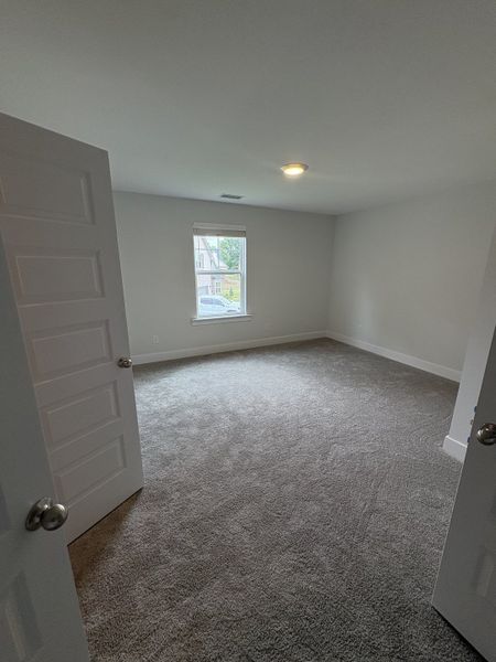 Spacious, unfurnished interior of a new home in Rookers Bend, Smyrna (Image 17).