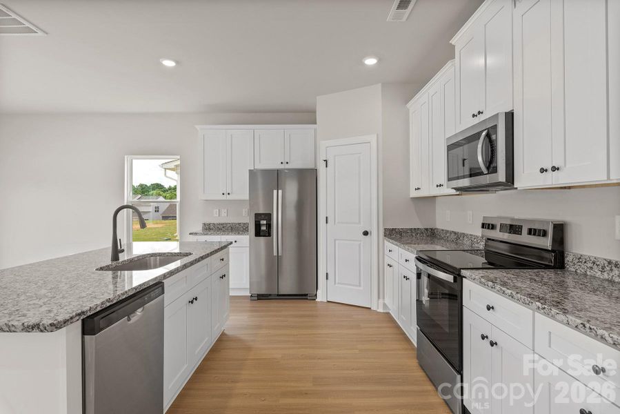Furnished interior view inside a new home in Ascot Woods, Charlotte (Image 4).