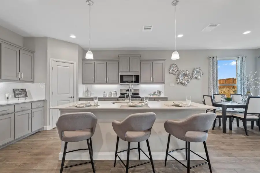 Furnished interior view inside a new home in Bluestem, Rhome (Image 7).