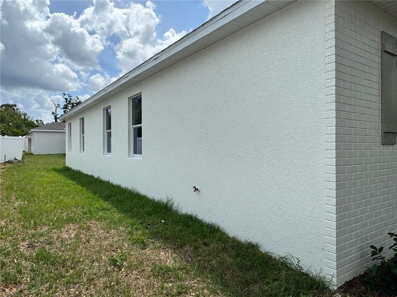 Exterior details and patio area of a home in , Dade City (Image 34).