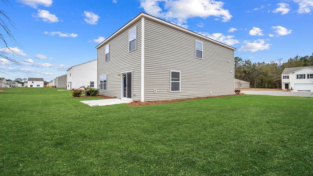 Exterior details and patio area of a home in Longleaf Village, Rincon (Image 2).