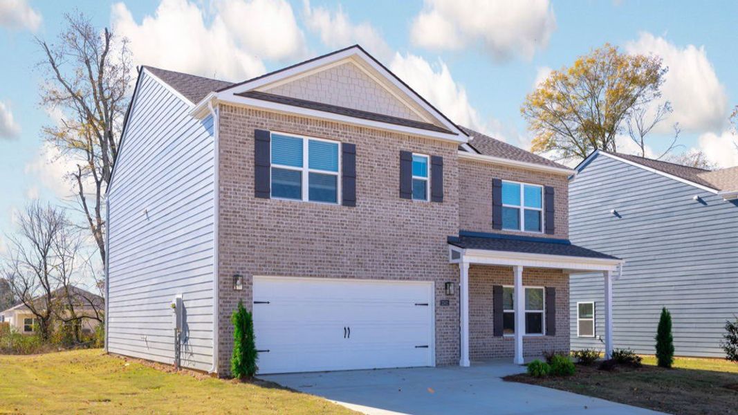 Front exterior of a new home in Fairview Hills, Cleveland, TN, highlighting curb appeal (Image 2).