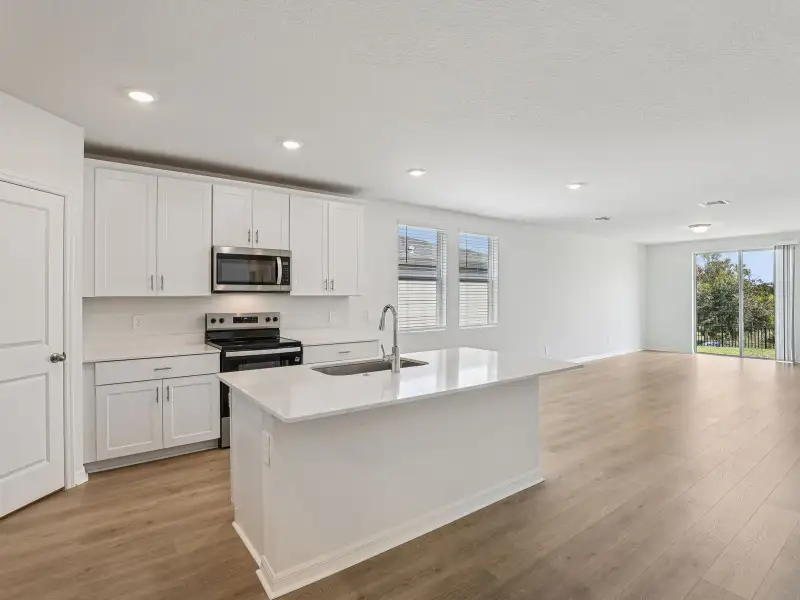 Furnished interior view inside a new home in Springs at Lake Alfred - Signature Series, Lake Alfred (Image 3).