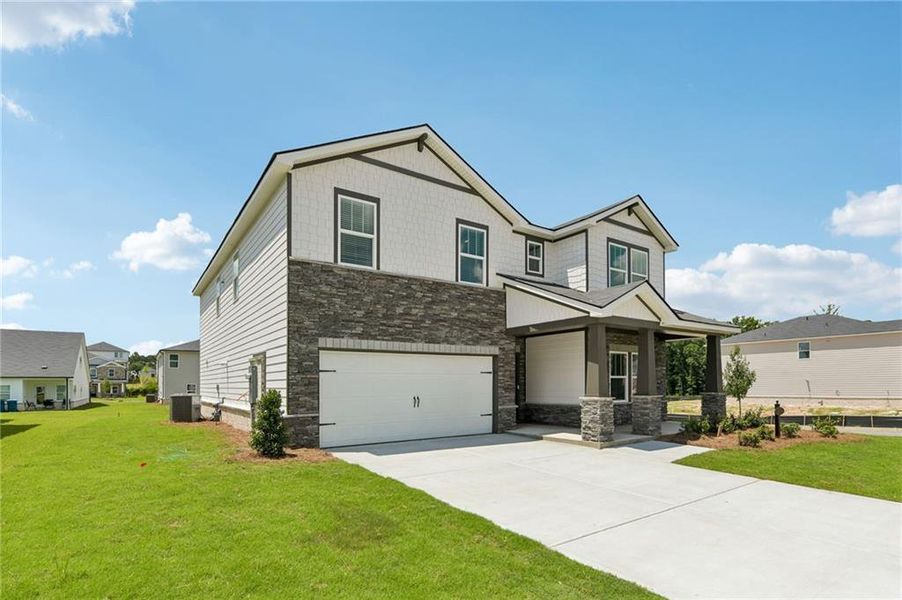 Front exterior of a new home in Parkside at Grayson, Grayson, GA, highlighting curb appeal (Image 24).