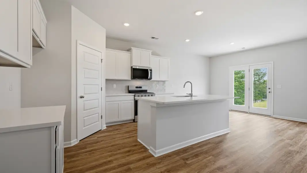 Furnished interior view inside a new home in The Preserve at Agricultural Village, Perry (Image 3).