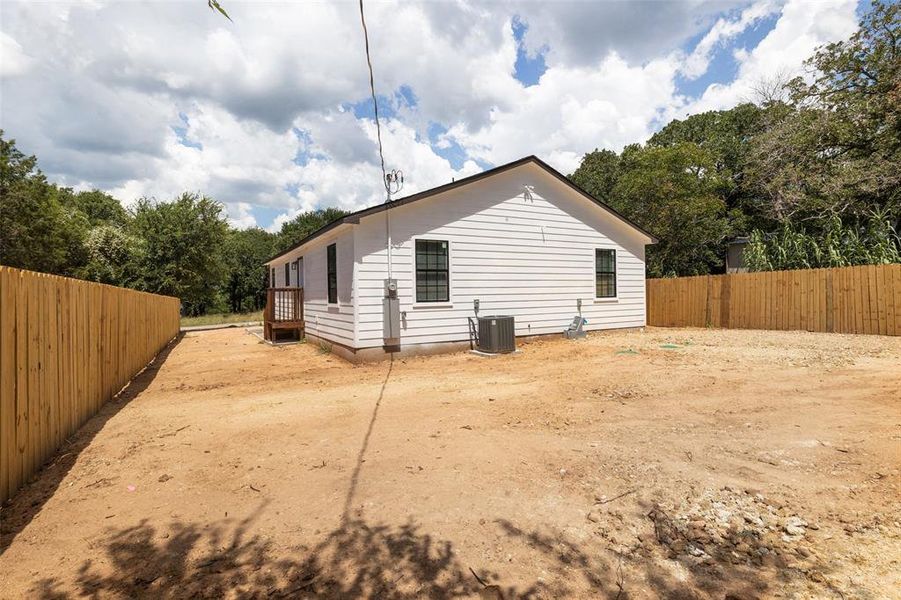 View of property exterior with central AC