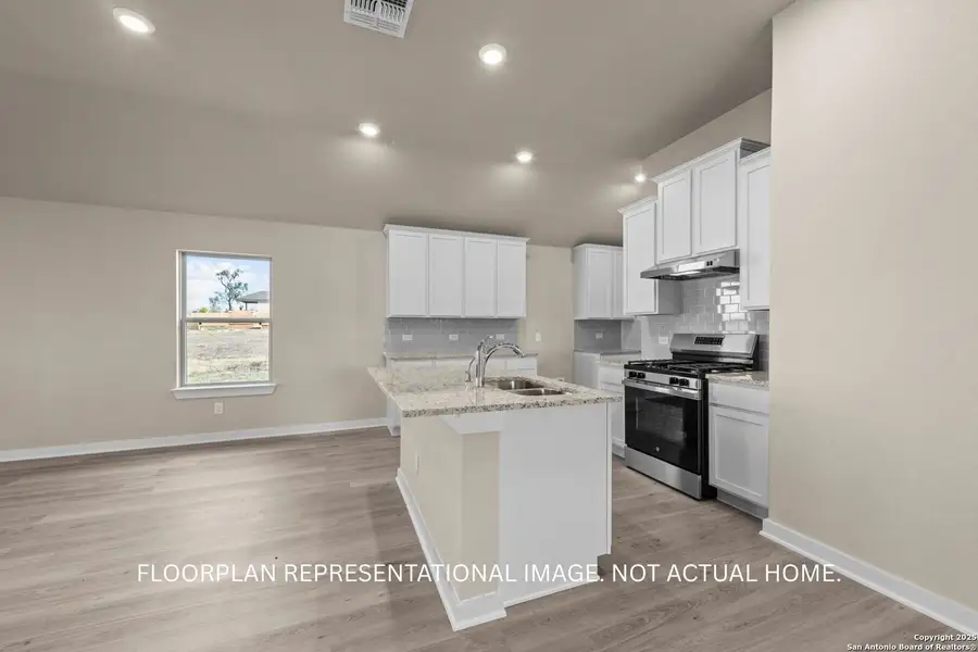 Furnished interior view inside a new home in Agave, San Antonio (Image 6).