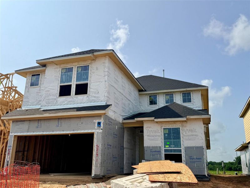 In-progress construction of a new home in Pecan Ridge, Fulshear, TX (Image 7).