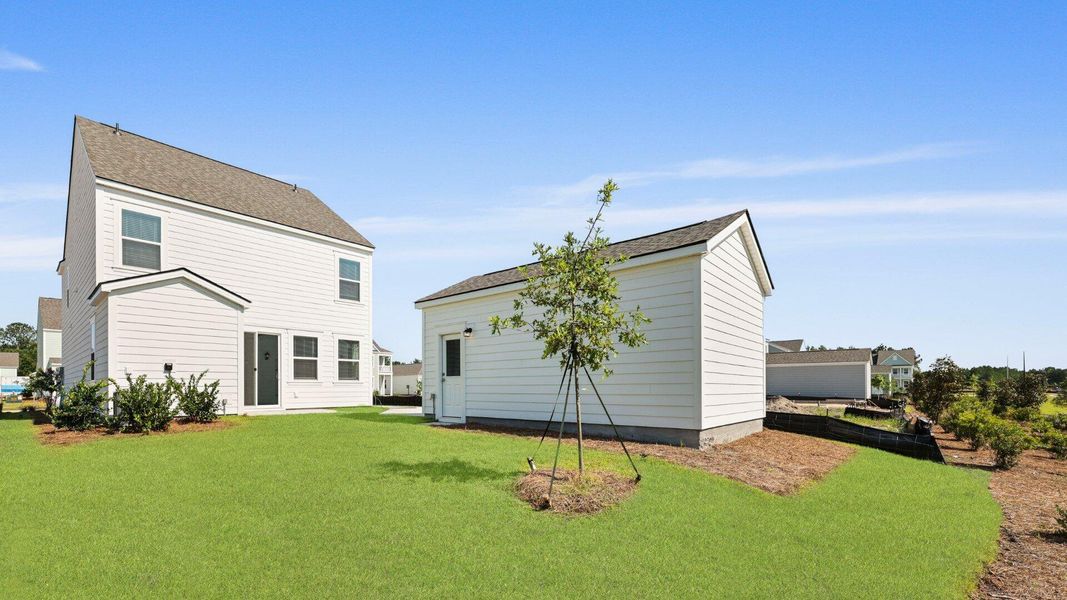 Front exterior of a new home in Sheep Island, Summerville, SC, highlighting curb appeal (Image 26).