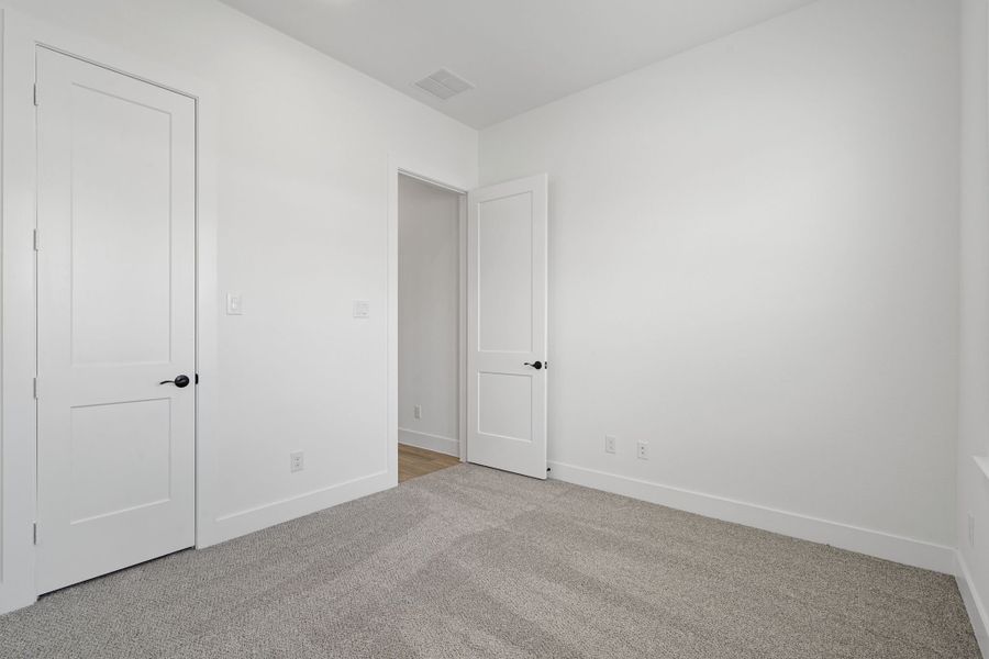 Representative unfurnished interior of a home built from the Malibu – 60′ Lot by Chesmar Homes in Fulshear Lakes, Fulshear (Image 13). Representative unfurnished interior of a home built from the Malibu – 60′ Lot by Chesmar Homes in Fulshear Lakes, Fulshear (Image 13).