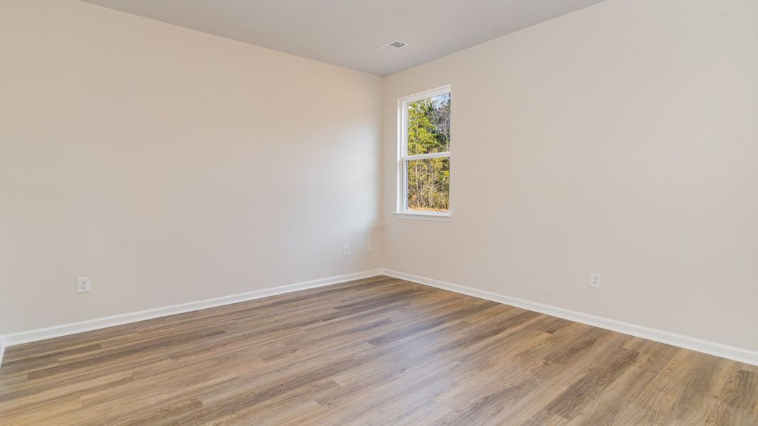 Representative unfurnished interior of a home built from the WREN by D.R. Horton in Saltgrass Landing, Winnabow (Image 19).