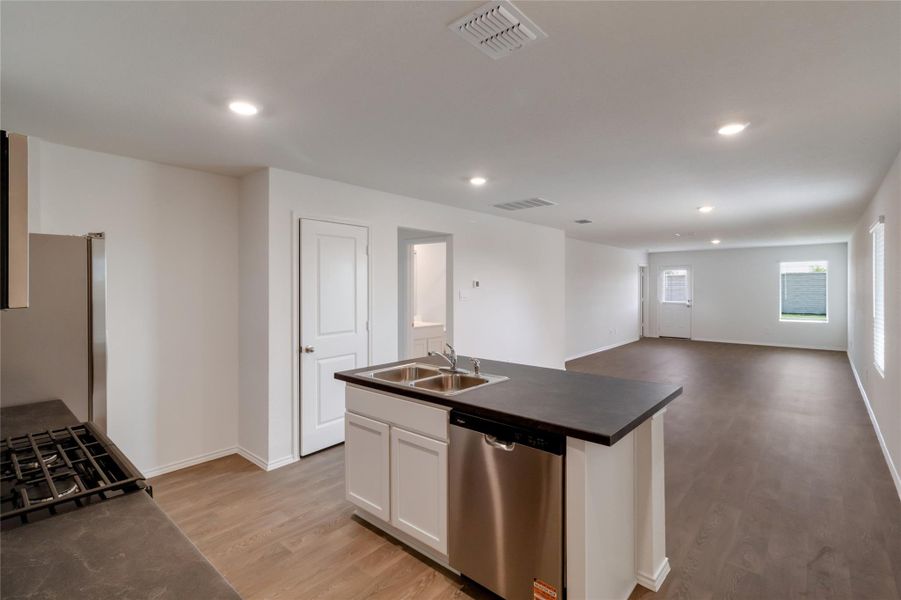 Furnished interior view inside a new home in Watermill, Uhland (Image 4).