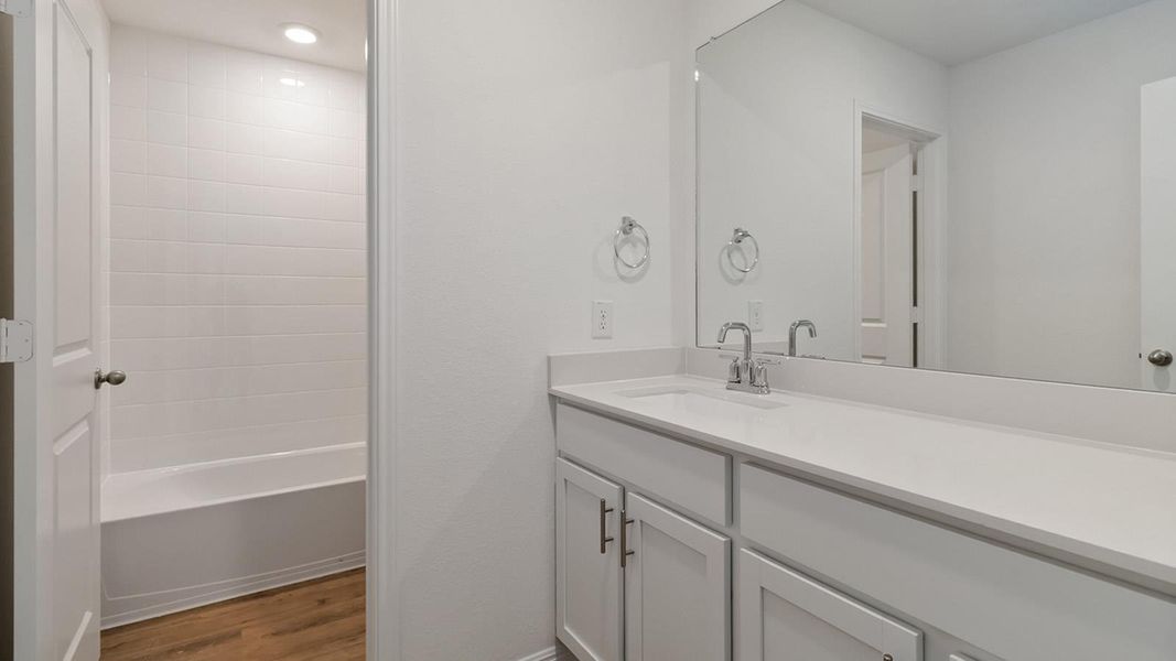 Furnished interior view inside a new home in Bar W Ranch, Leander (Image 8).