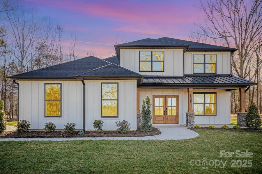 Front exterior of a new home in , Waxhaw, NC, highlighting curb appeal (Image 1). Front exterior of a new home in , Waxhaw, NC, highlighting curb appeal (Image 1).