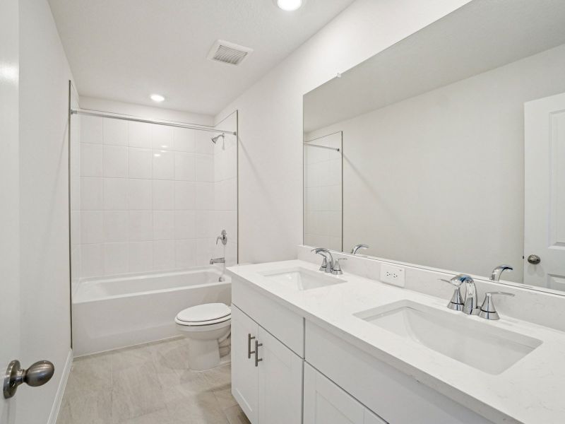 Furnished interior view inside a new home in Two Rivers - Classic Series, Zephyrhills (Image 8).