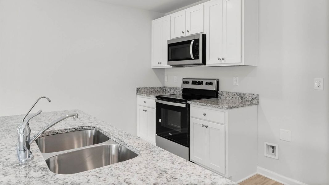 Representative furnished interior of a home built from the Freeport by D.R. Horton in Owl's Head Farms, Freeport (Image 3). Representative furnished interior of a home built from the Freeport by D.R. Horton in Owl's Head Farms, Freeport (Image 3).