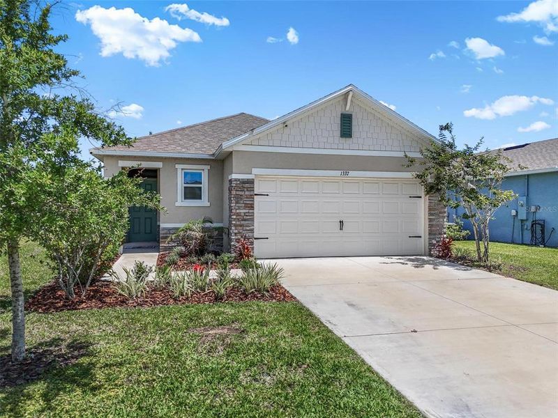 Front exterior of a new home in , Ormond Beach, FL, highlighting curb appeal (Image 23). Front exterior of a new home in , Ormond Beach, FL, highlighting curb appeal (Image 23).