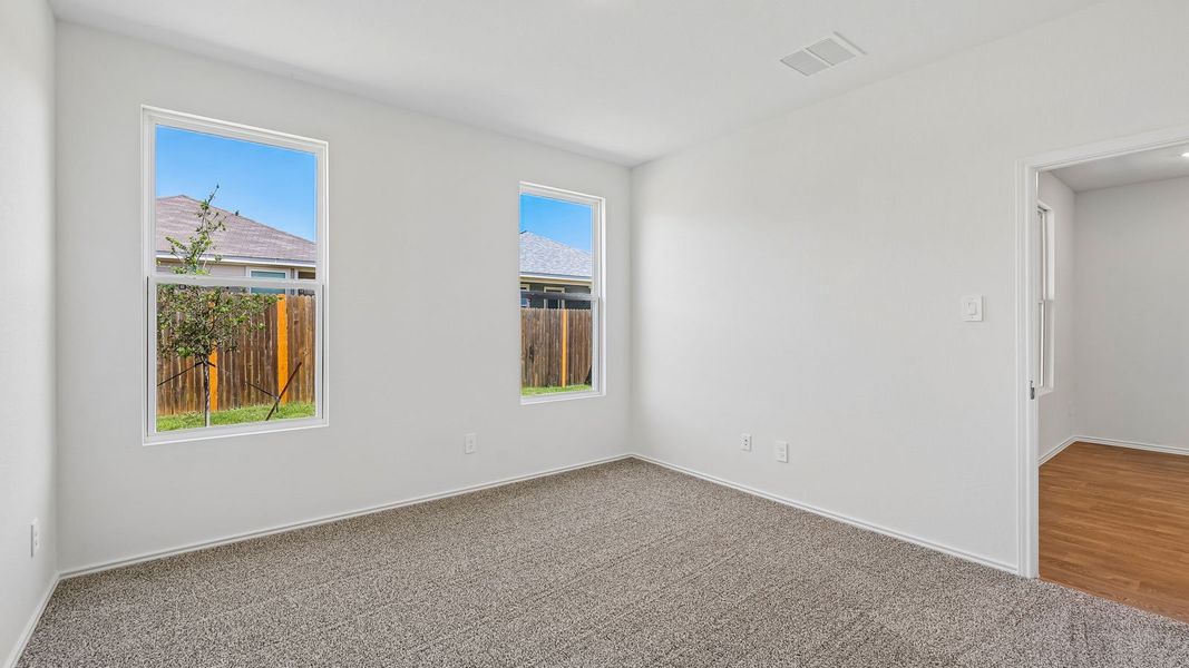 Spacious, unfurnished interior of a new home in Wayside, Uhland (Image 28).