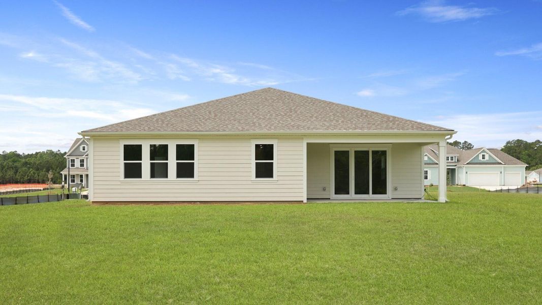Front exterior of a new home in Berkeley Bay, Ridgeville, SC, highlighting curb appeal (Image 26).
