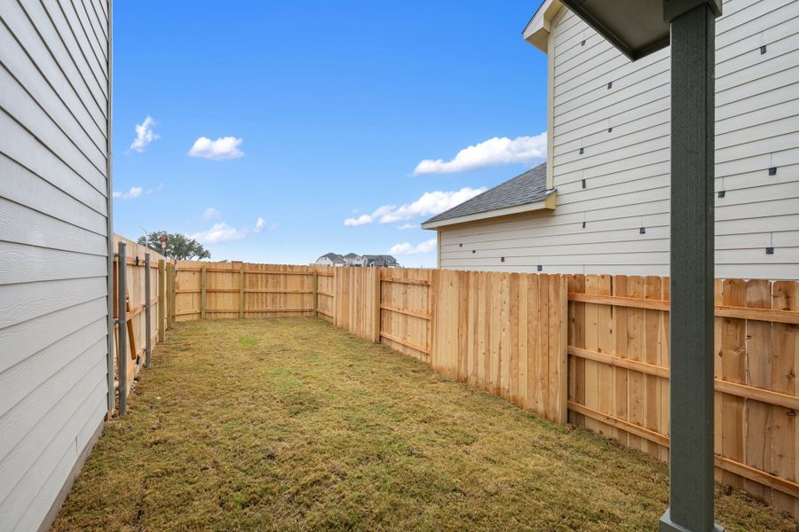 Representative exterior details of a home built from the Robin by Ashton Woods in The Cottages at Lariat, Liberty Hill (Image 28). Representative exterior details of a home built from the Robin by Ashton Woods in The Cottages at Lariat, Liberty Hill (Image 28).