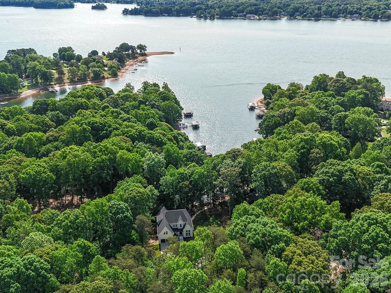 Aerial view highlighting the property boundaries and private wooded lot just moments from the shores of Lake Norman.