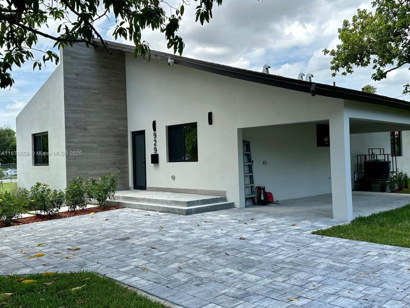 Front exterior of a new home in , Miami, FL, highlighting curb appeal (Image 38).