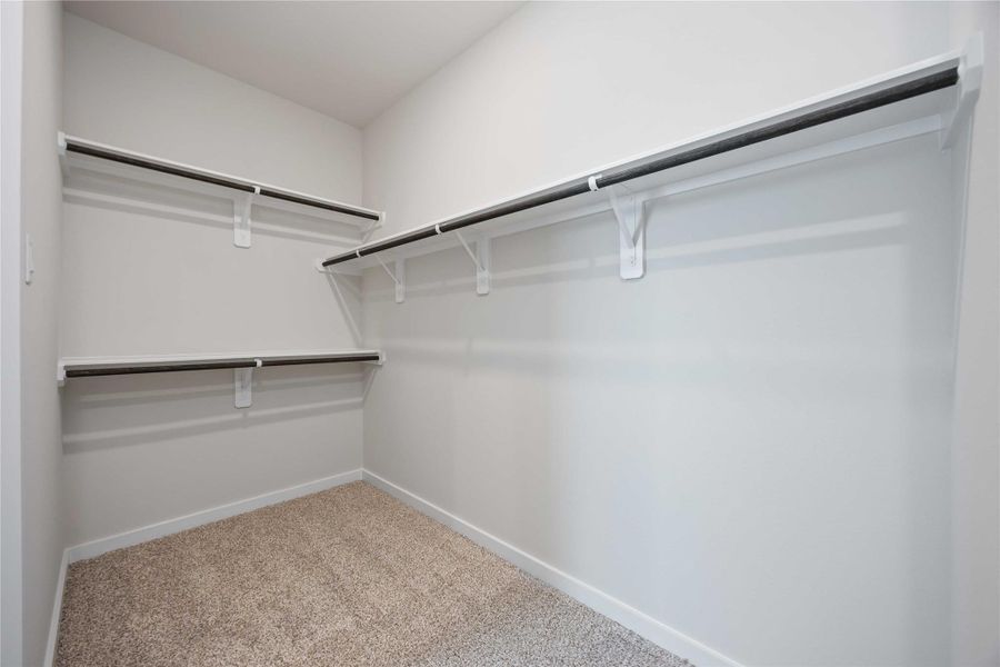 Retreat to the primary bedroom, which features a huge walk-in closet and luxury bathroom. Retreat to the primary bedroom, which features a huge walk-in closet and luxury bathroom.