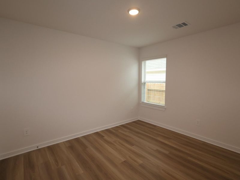 Spacious, unfurnished interior of a new home in Lone Star Landing, Montgomery (Image 21).