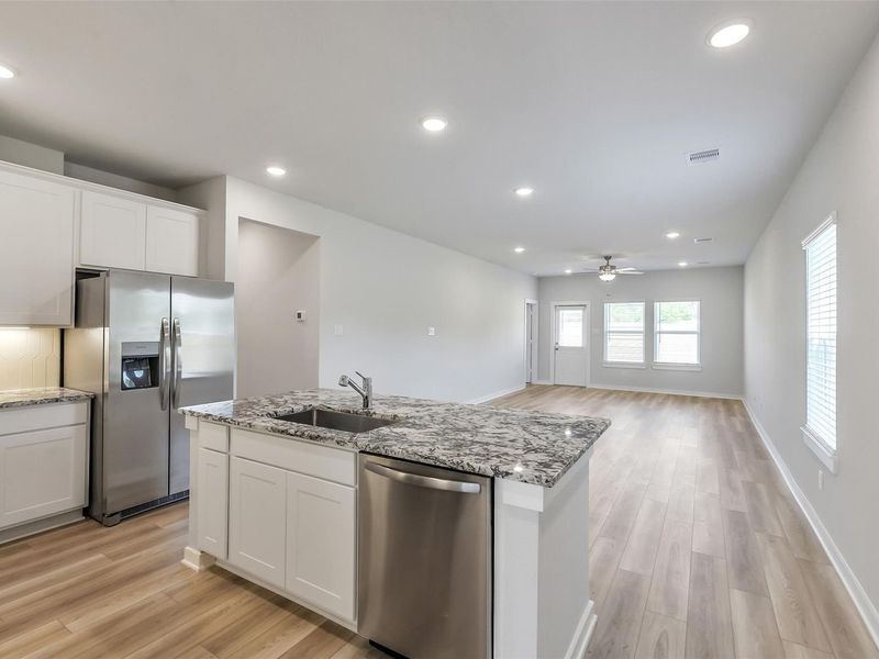 Furnished interior view inside a new home in Caney Creek Place, Conroe (Image 8).