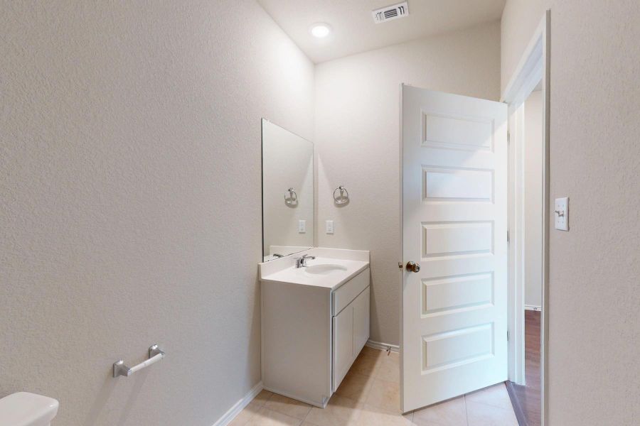 Furnished interior view inside a new home in Carillon, Manor (Image 7).