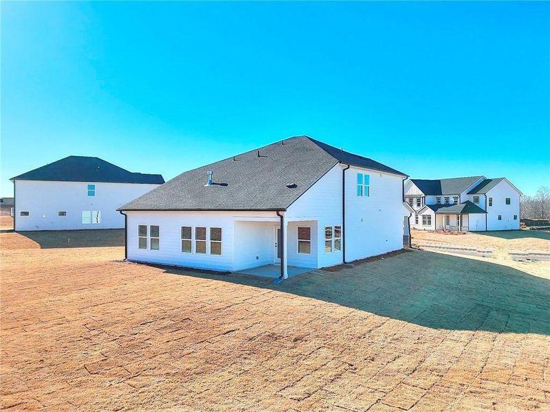 Exterior details and patio area of a home in River Pointe, Monroe (Image 33).