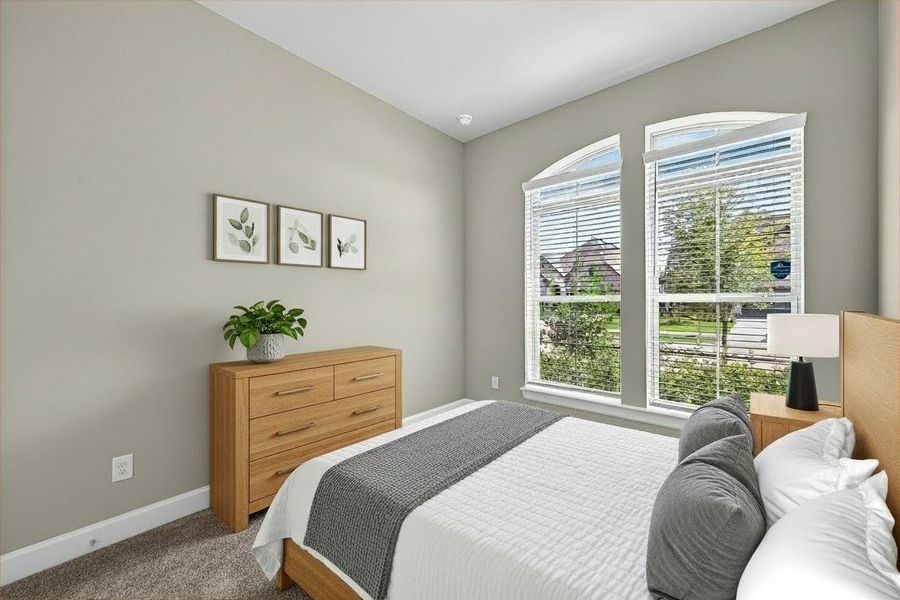 Experience the potential of this beautifully virtually staged bedroom, featuring elegant décor and abundant natural light through large windows. Perfect for creating your dream retreat.