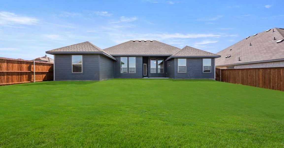 Representative exterior photo of a completed home built from the Alderbury by Impression Homes in Timberbrook, Justin, TX (Image 24).