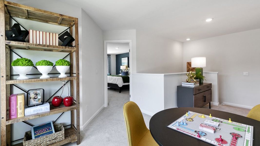 Representative furnished interior of a home built from the CARSON - TRADITIONS by D.R. Horton in Chapel Townes, Raleigh (Image 18).