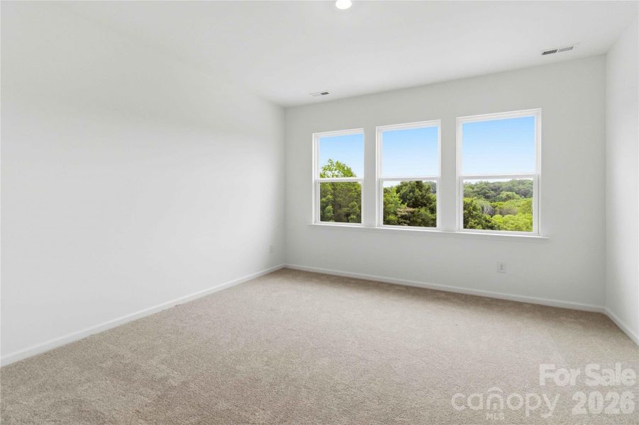 Spacious, unfurnished interior of a new home in Ridge at Sugar Creek, Indian Land (Image 24).