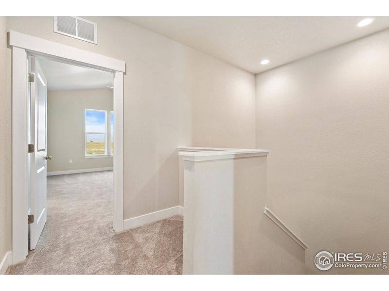 Upstairs flex space for a reading nook or small home office