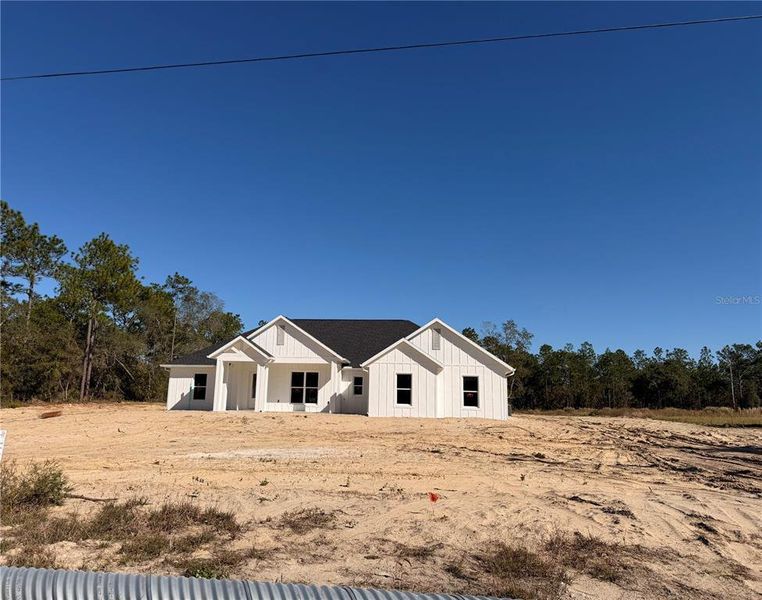 Front exterior of a new home in , Ocala, FL, highlighting curb appeal (Image 19).