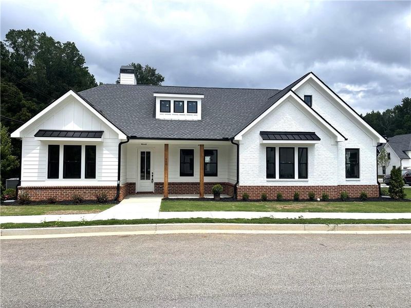 Front exterior of a new home in , Monroe, GA, highlighting curb appeal (Image 22).