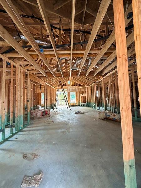 Misc room with unfinished concrete flooring