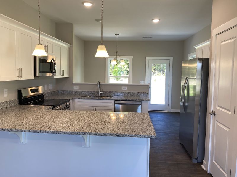 Representative furnished interior of a home built from the Madison by Foundation Home Builders LLC in Pinnix Loop, Burlington (Image 4).